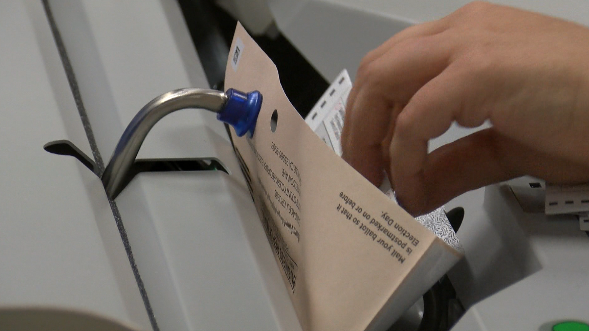 ballot extractor device